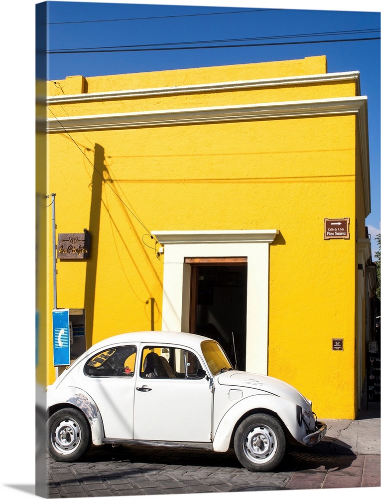 Yellow building and white VW bug, Oaxaca, Mexico, North America
