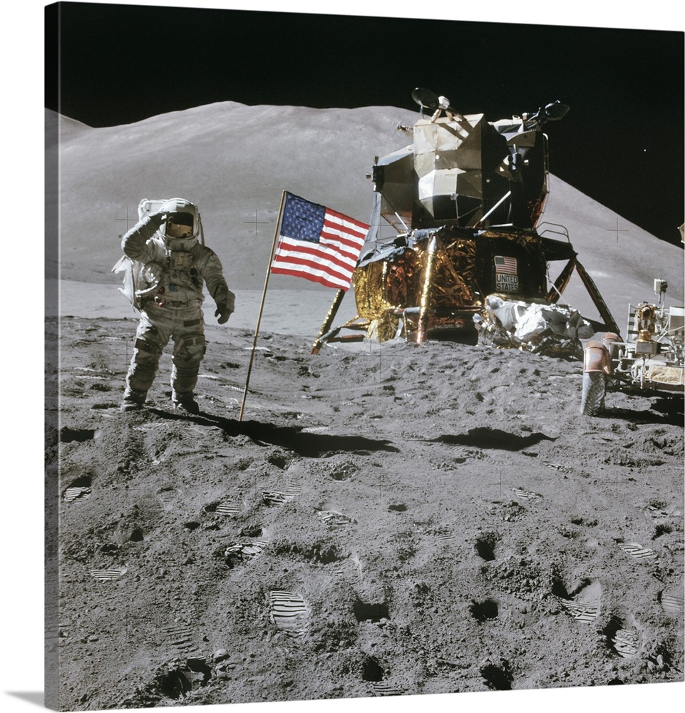 Apollo 15 lunar surface exploration, August 1971. US astronaut James Irwin saluting next to the US flag by the Lunar Modul...