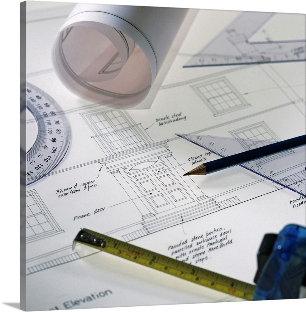 Architectural drawings and equipment used in the design of a house.