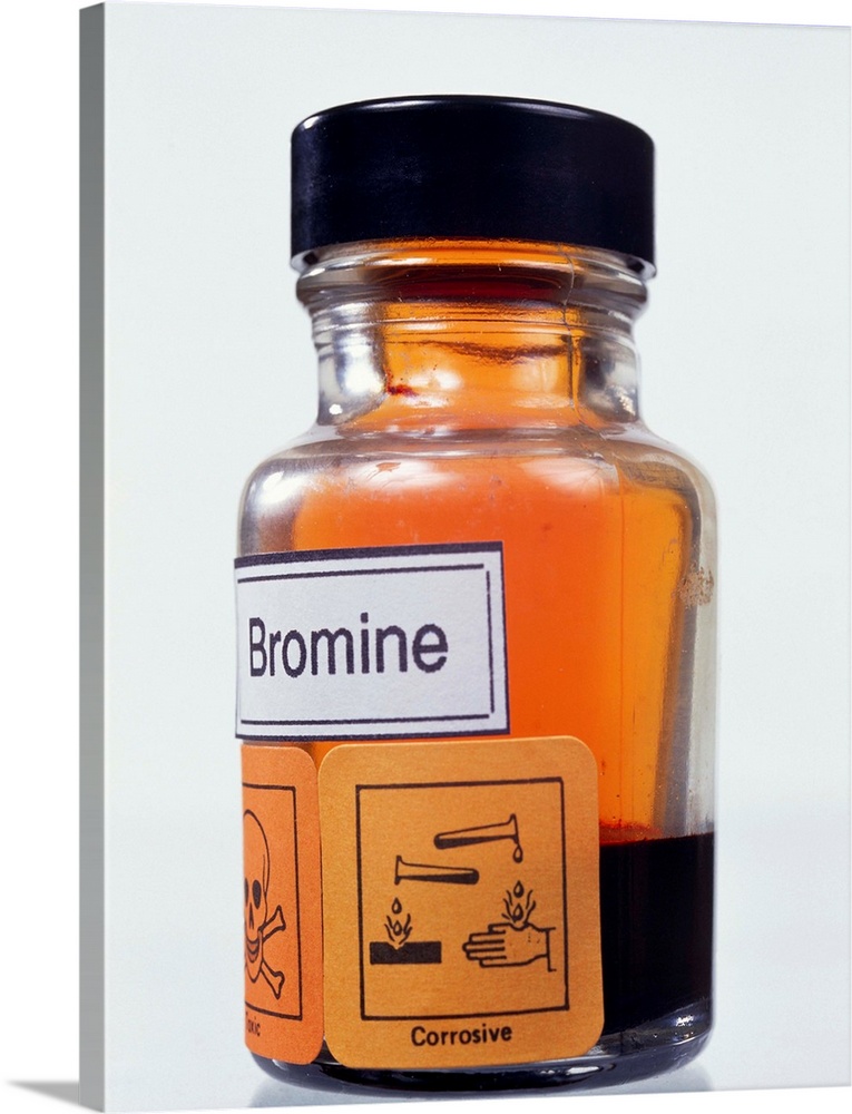 Bromine liquid stored in a jar with corrosion and toxicity hazard signs. Bromine liquid is weakly bonded and readily vapor...