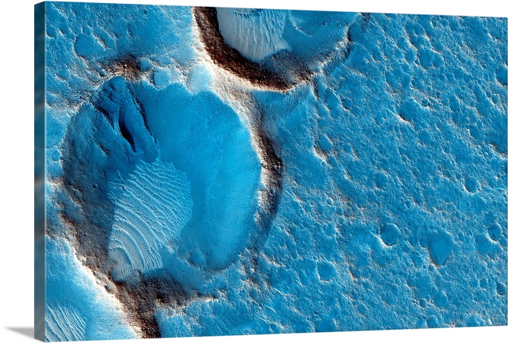 Craters on Mars. Satellite image showing wind-blown deposits inside a group of eroded craters on the surface of Mars. This...