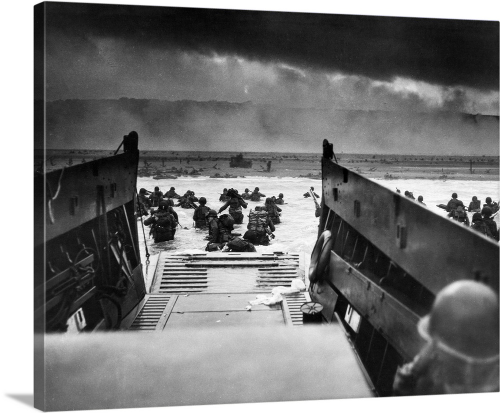 D-Day landings. US Coast Guard-manned LCVP disembarking troops on the morning of 6 June 1944 at Omaha Beach in one of the ...