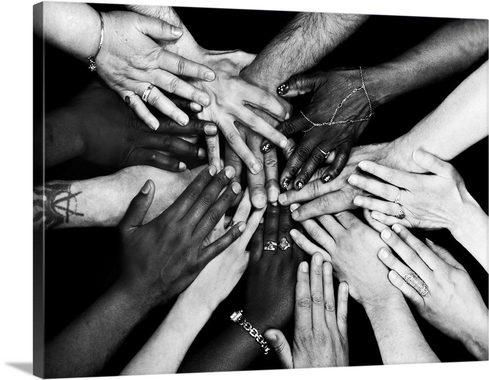 Diversity and unity. Conceptual image of the hands of people of different ages, genders and ethnicities, joining hands in ...