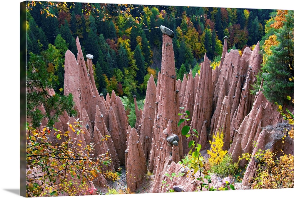 Earth Pyramids. These spires are an example of a landform known as hoodoos. They are composed of unconsolidated material (...