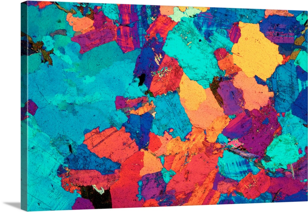 Polarised light micrograph of fine-grained light-colored granite from Aberdeen, Scotland. This specimen consistist almost ...