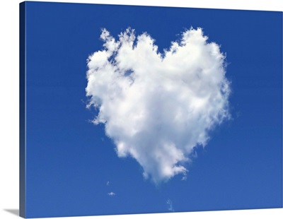 Heart Shaped Cloud Against A Blue Sky