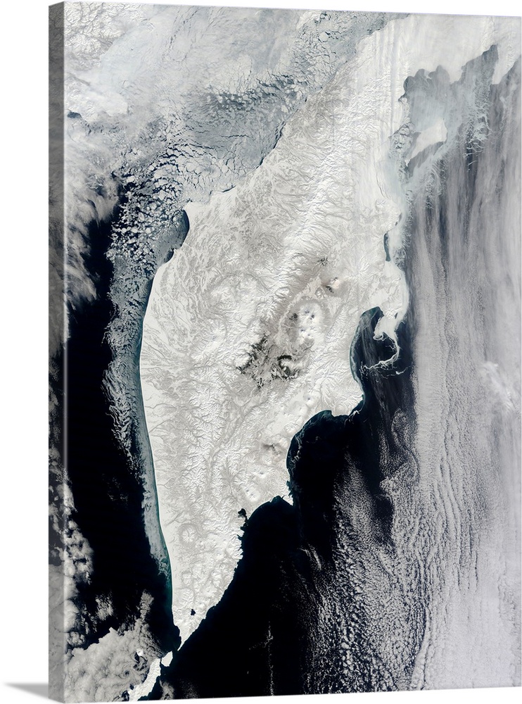 Kamchatka Peninsula, satellite image. The Kamchatka Peninsula lies at the far east of the Russian Federation. The region c...