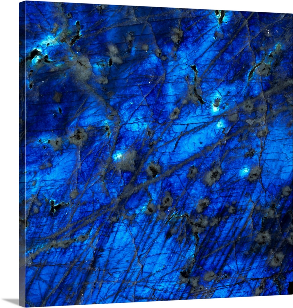 Labradorite. Close-up of the surface of a rich blue specimen of the mineral labradorite (calcium sodium aluminum silicate).