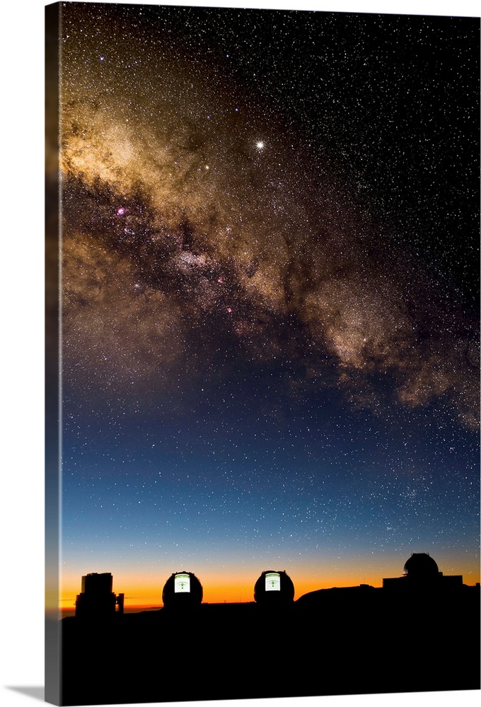 Milky way and observatories. These observatories are on the summit of Mauna Kea, Hawaii, USA. From left to right they are:...