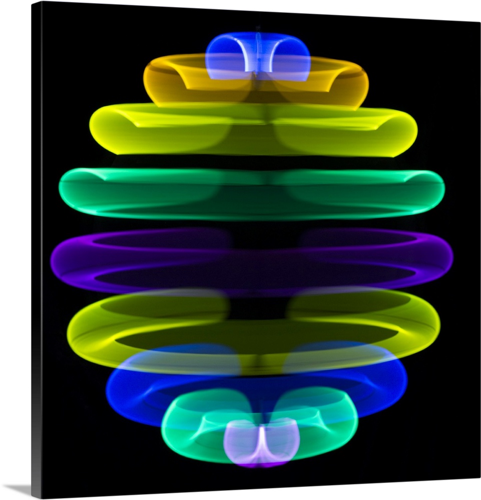 Multicoloured spinning light trails.