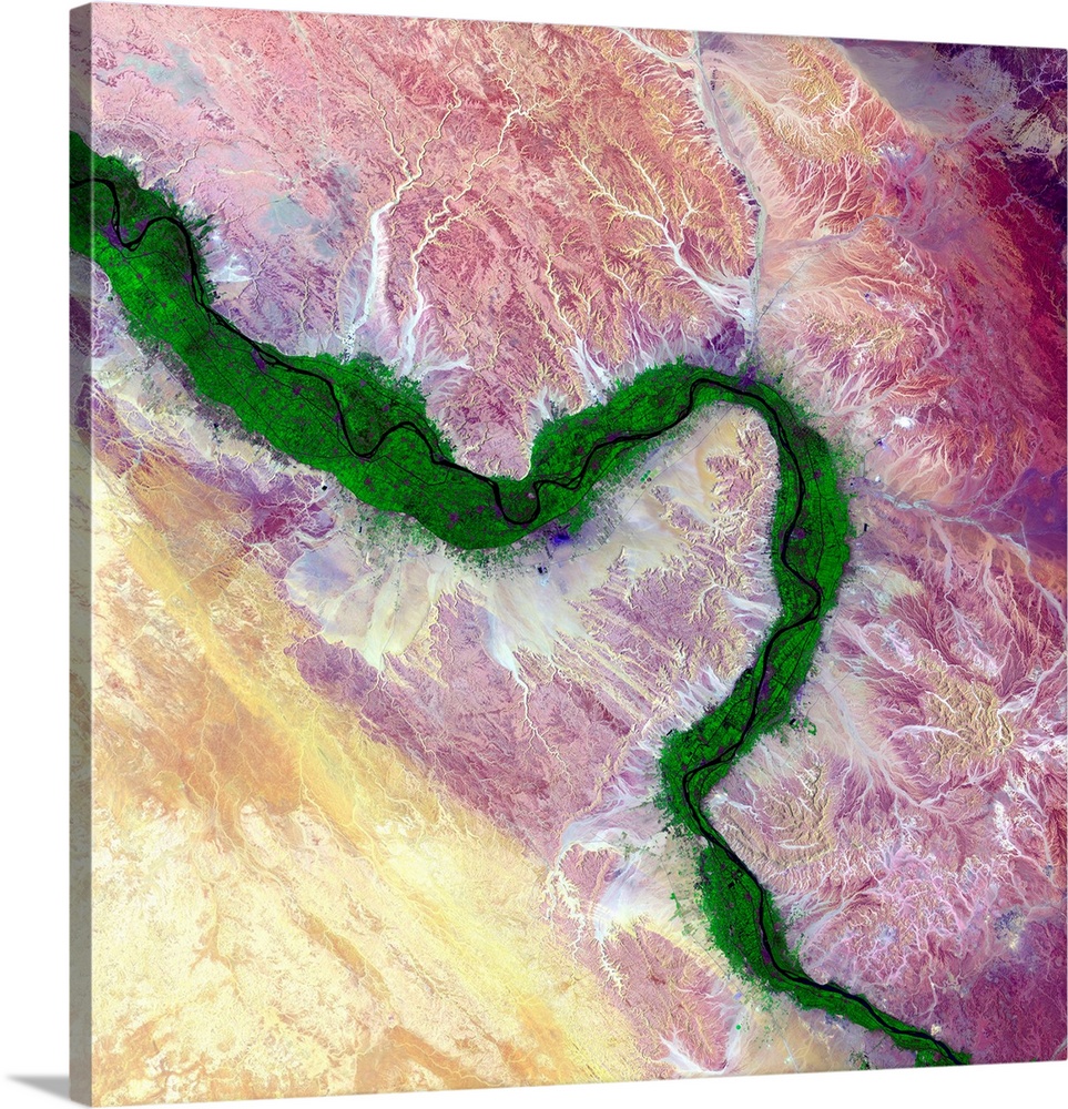 Nile and Egyptian desert, satellite image. Along the Nile River in Egypt, farmland (green) is maintained on the river's fl...