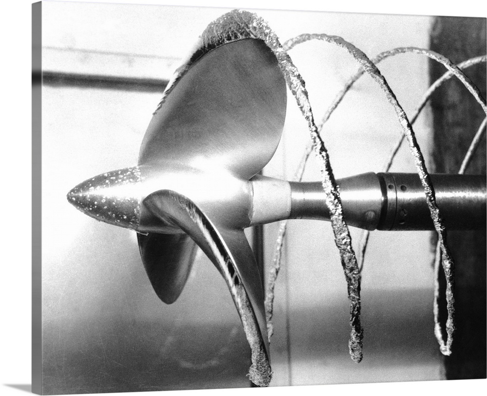 Propeller cavitation. Test being carried out on a propeller to study cavitation effects. Cavitation is the formation of bu...