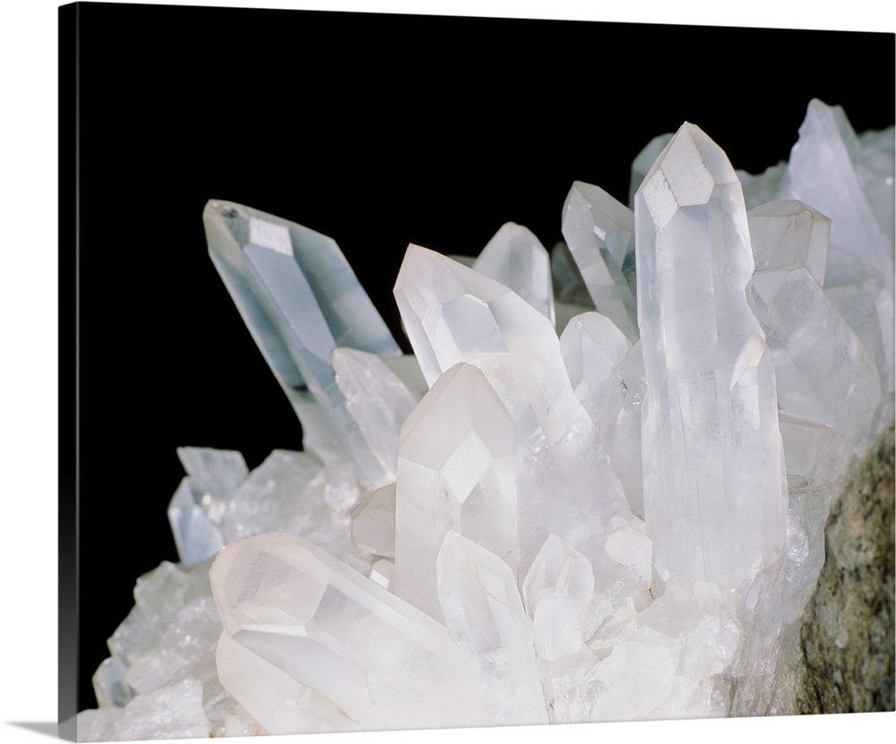 Quartz crystals, the most abundant and common mineral consisting of crystalline silica (silicon dioxide). The well-formed ...