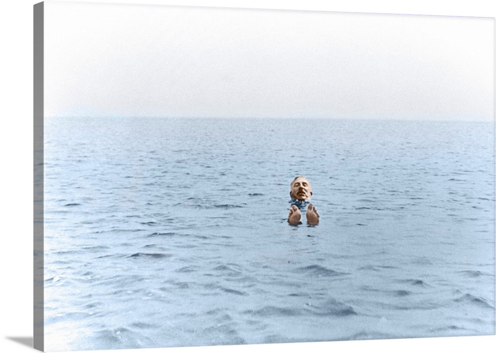 The New Zealand born physicist Sir Ernest Rutherford (1871-1937) taking a swim off the coast of Dorset (1931). In 1903, to...