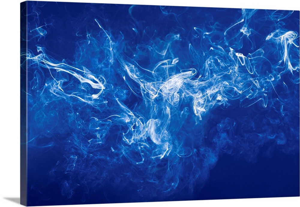Smoke against a black background.