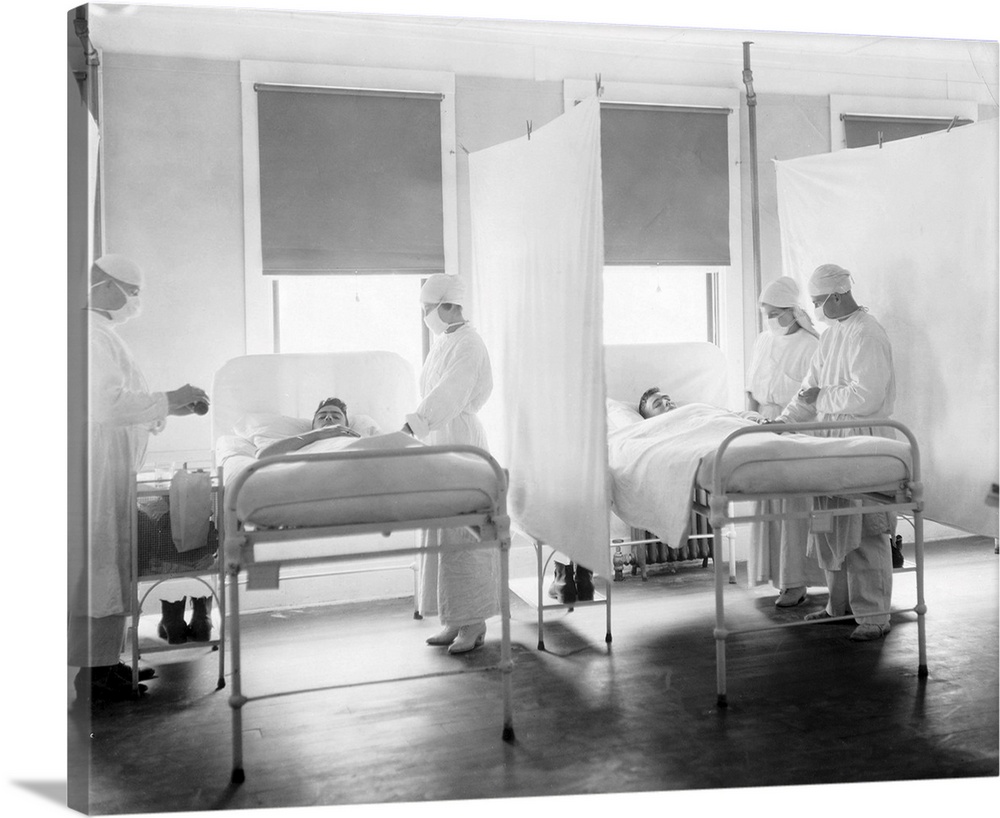 Spanish flu nursing ward. Nurses and doctors with face masks attending to patients with Spanish influenza. The 1918 Spanis...