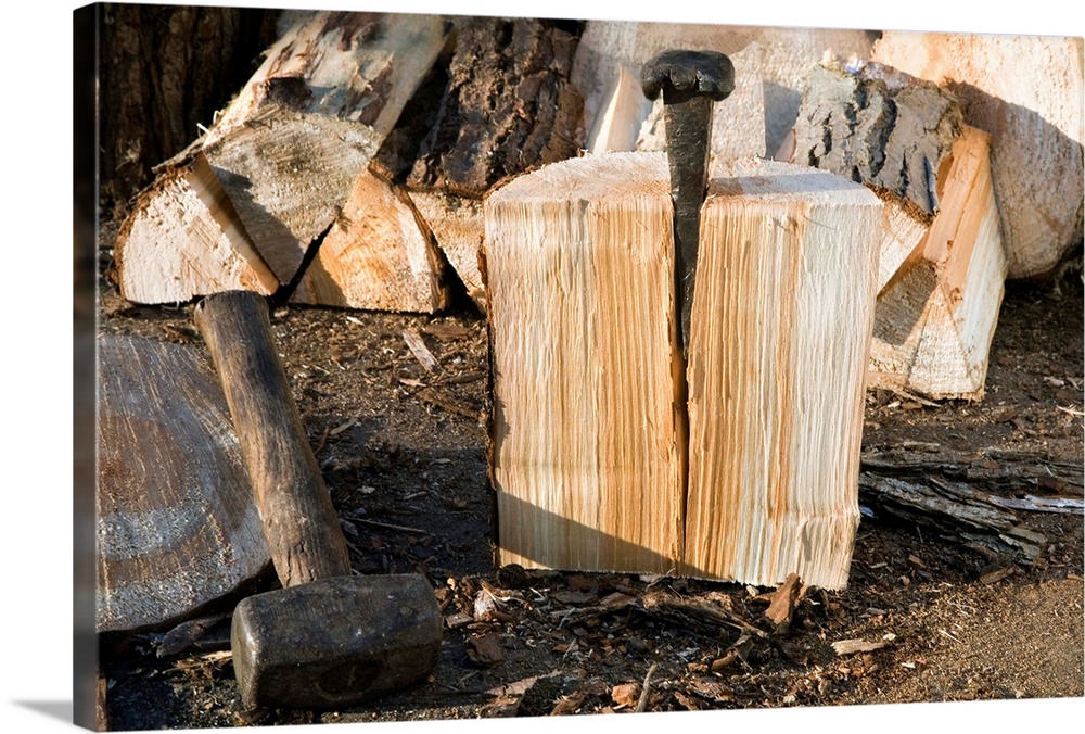Splitting of part of a transverse section of a log using a wedge and club hammer. The high elasticity of the seasoned wood...