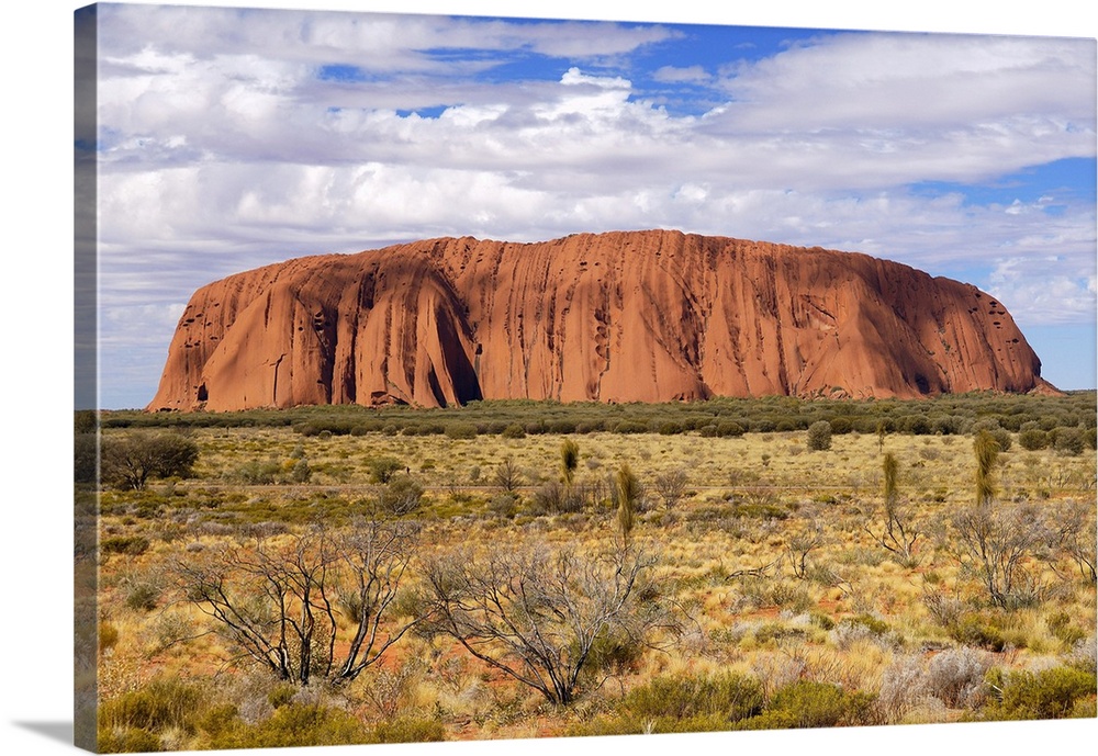 Uluru (Ayers Rock) in the morning. Uluru is a large sandstone rock formation in the southern part of the Northern Territor...