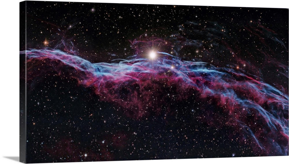 Veil Nebula (IC 1340), optical image. The Veil Nebula is a cloud of heated and ionized gas and dust in the constellation C...