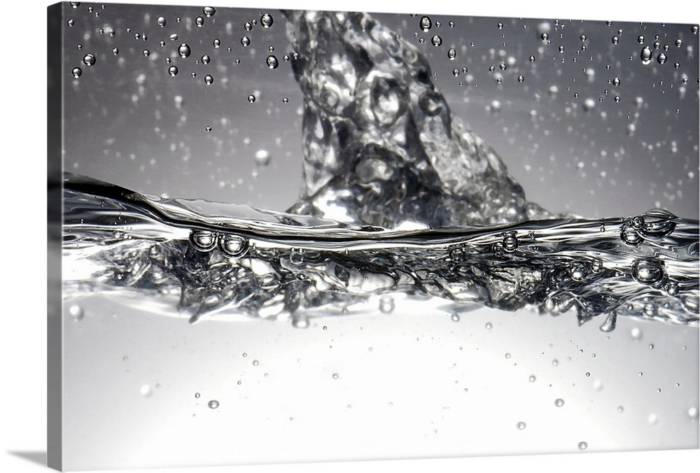 Water, high-speed photograph. Close-up of turbulent water showing many bubbles produced in the process.