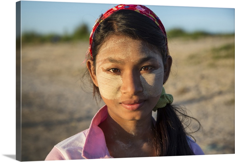 Burmese girl with Tanaka face paint in Bagan Burma
