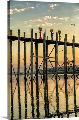 Burmese Women Walking With Baskets On The Ubein Bridge In Mandalay