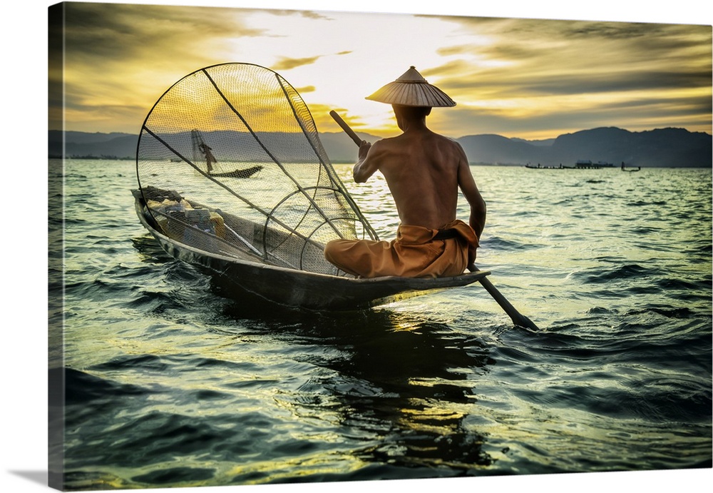 Fisherman at sunset in Inle Lake, Burma