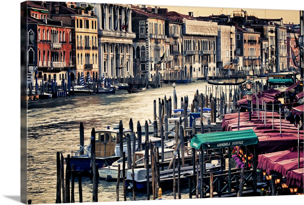 Photograph of the famous gondola boats on the river in Venice, Italy.