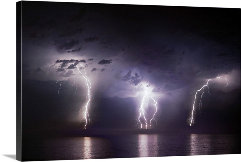 Lightning strikes over the ocean | Great Big Canvas