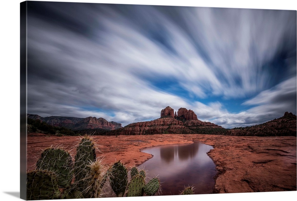 Reflection of Cathedral Rocks in water in Sedona, Arizona.