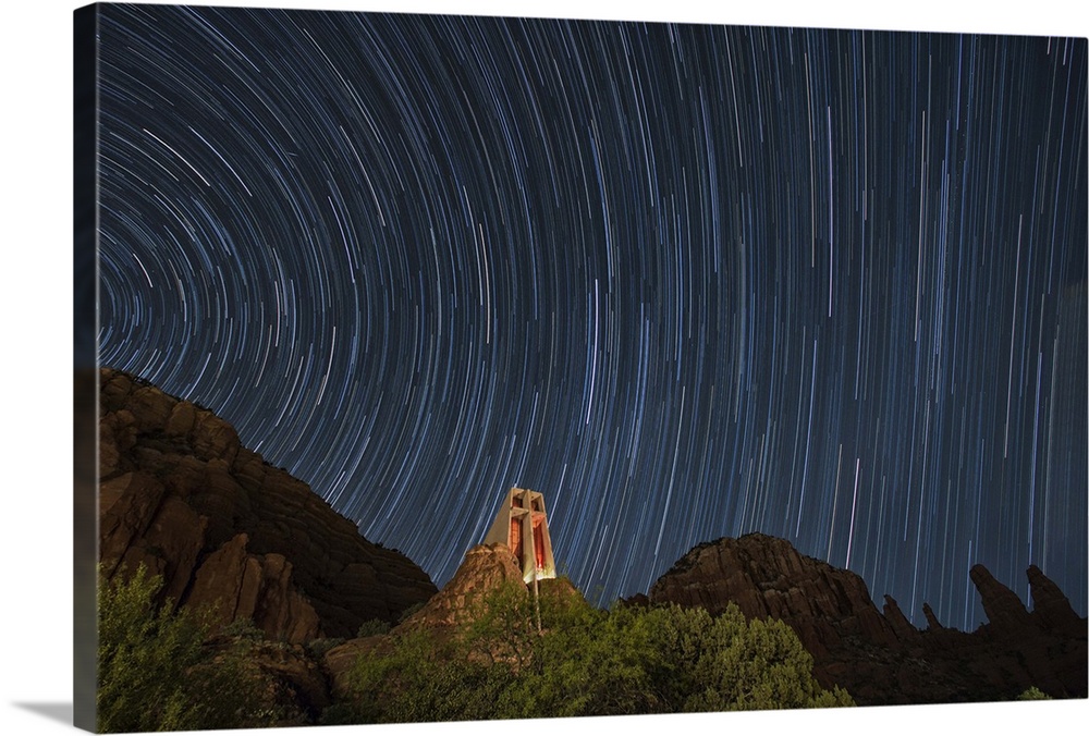Star trails above the Chapel of the Holy Cross in Sedona, Arizona