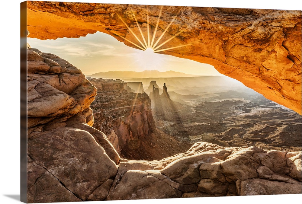 Sunrise over Mesa Arch in Canyondlands National Park in Moab.