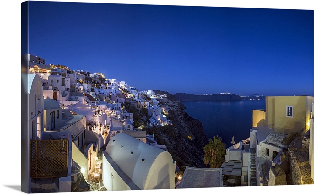 Sunset at Oia, on the island of Santorini, Greece