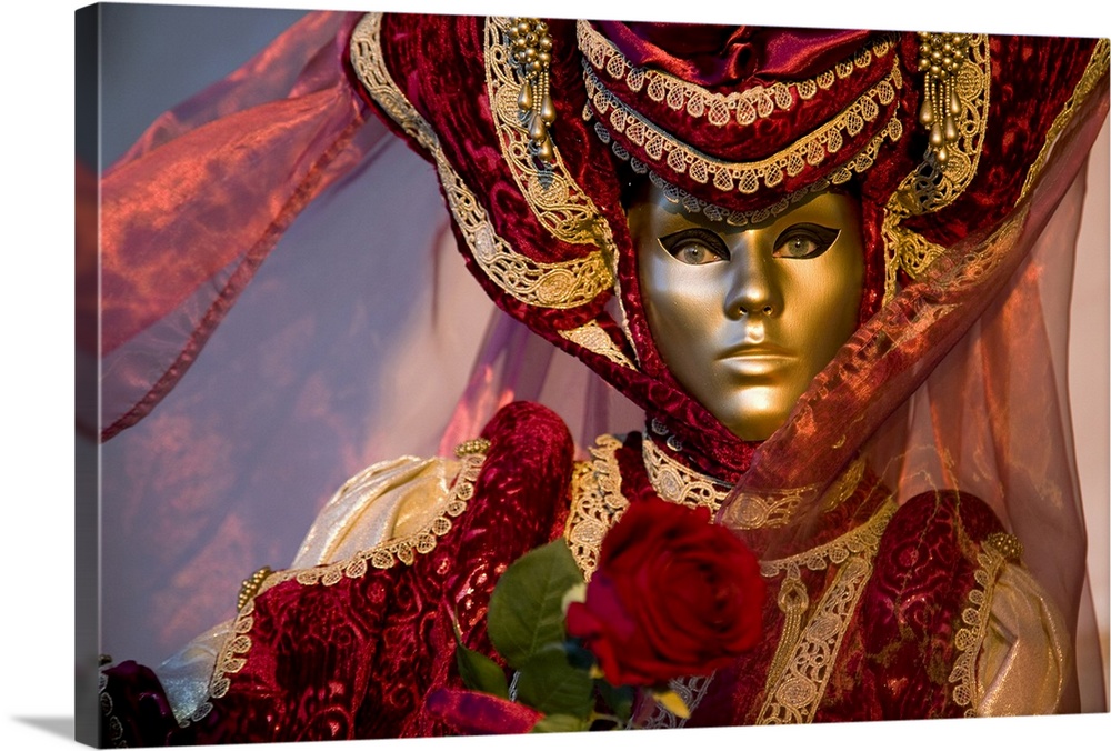 Large photo on canvas of a woman dressed up wearing a smooth mask in Italy.