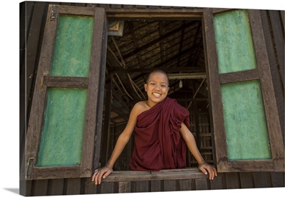 Young Burmese monk in his monastery
