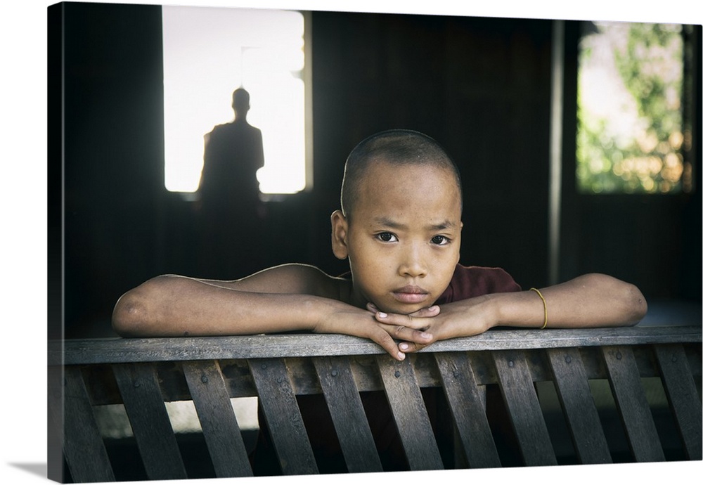 Young Burmese monk in his monastery