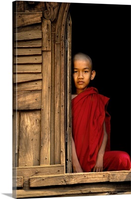 Young Burmese monk in his monastery, Bagan, Burma