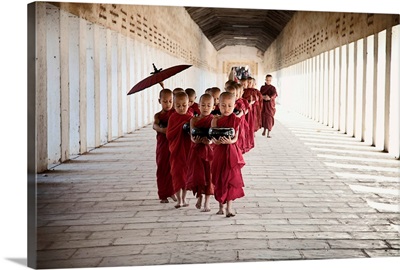 Young monks walking in their monastery, Bagan, Burma