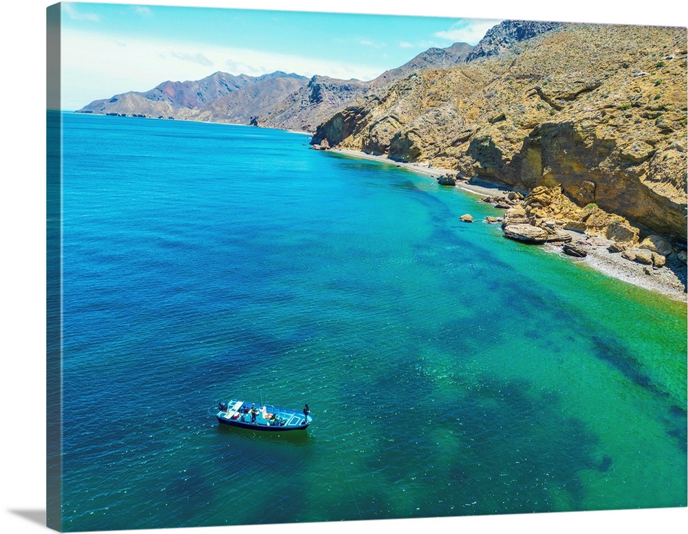 A Boat Fishes The Remote Shore Of Mexico's Cedros Island