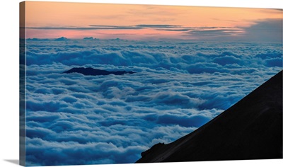 Clouds Roll In Along The Slopes Of The Mauna Kea Volcano On Hawaii's Big Island