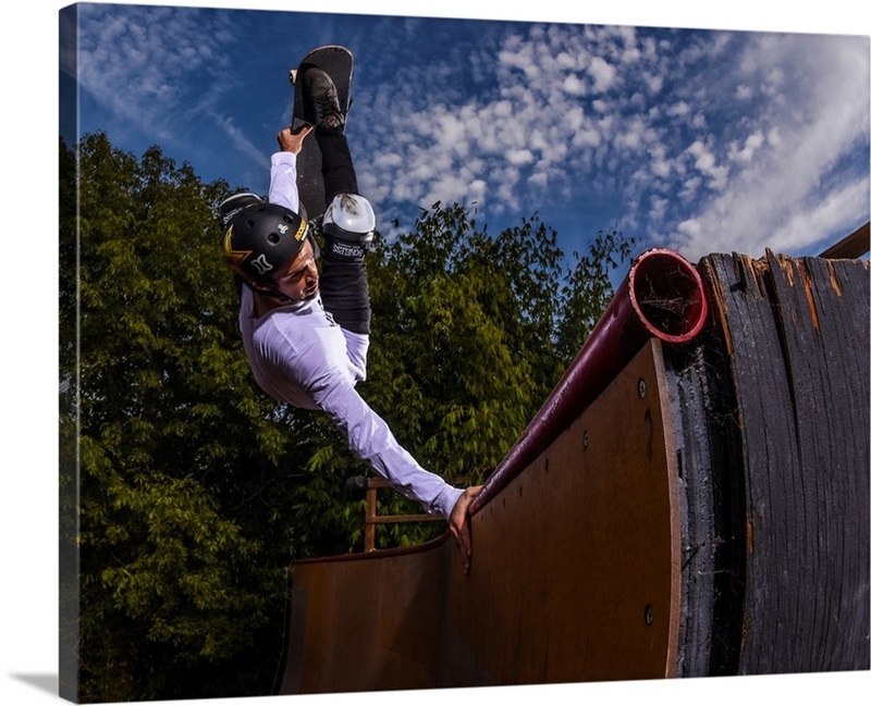 Elliot Sloan throws a frontside invert on his home ramp | Great Big Canvas