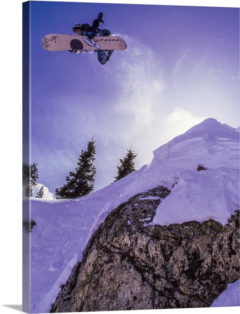 Jay Nelson flying on his snowboard over the Loveland Pass, Colorado, in the mid 90's.