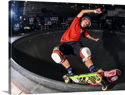 Kiko Saucee grinding on a railing at Vans Skatepark, 2016