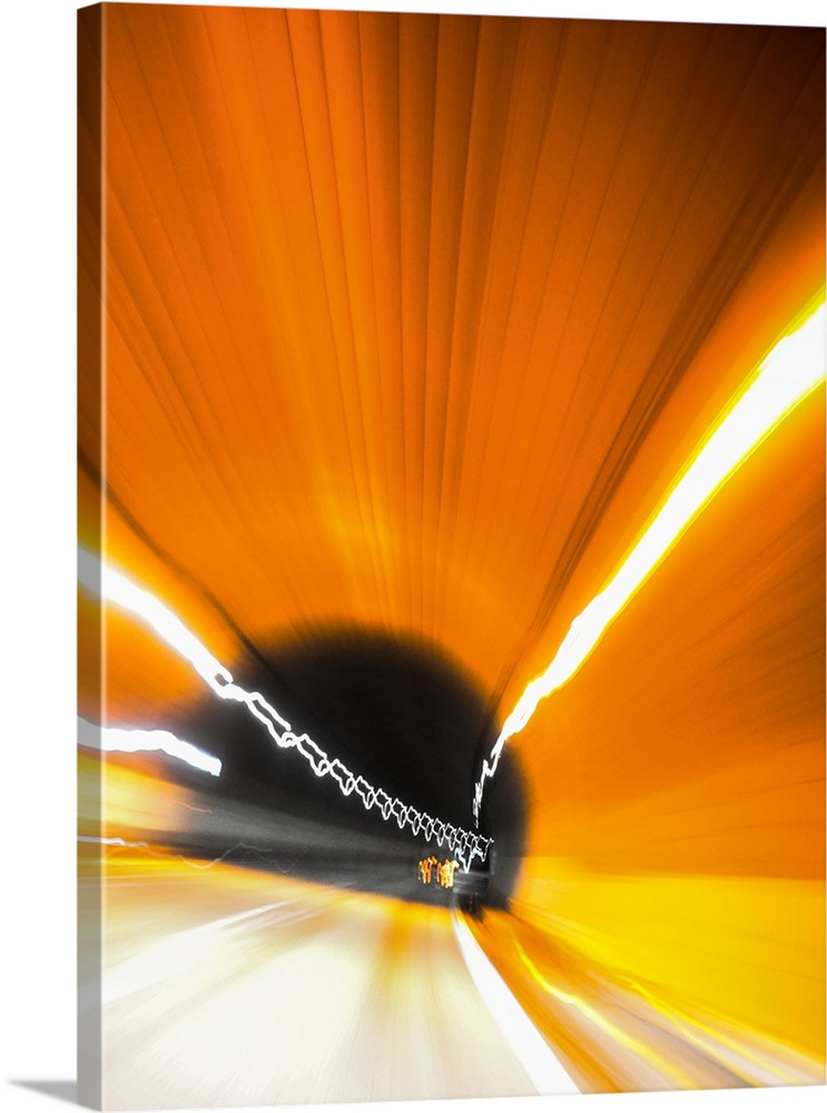 Blurred motion image of light trails in a tunnel at night in San Francisco, 2012.