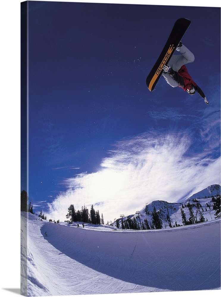 Scott Eckhard performing a straight air jump at Mammoth Mountain Ski Area, California.