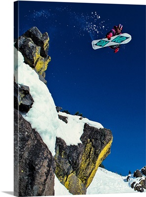 Shawn Farmer snowboarding off a cliff at Lake Tahoe, California, 1992