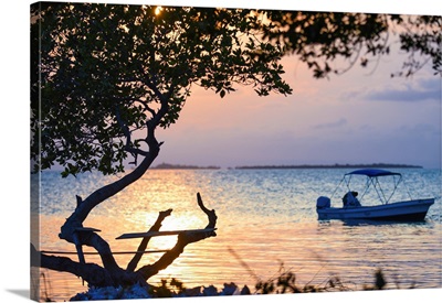The Sun Sets Over An Insecure Fishing Perch On Buttonwood Caye In Southern Belize