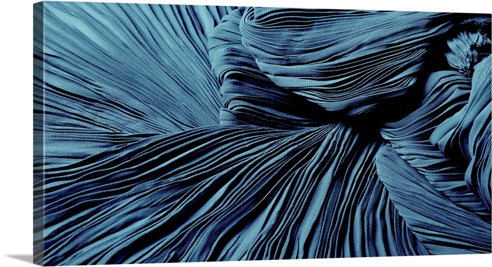 A Shiny Finished Folded Satin Fabric In Blue