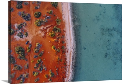 Aerial Image Of Red Western Australian Mainland Contrasiting With Turquoise Water