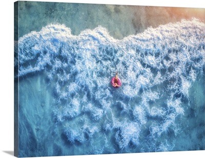Aerial View Of Woman With Donut Float In The Transparent Blue Sea At Sunset In Summer